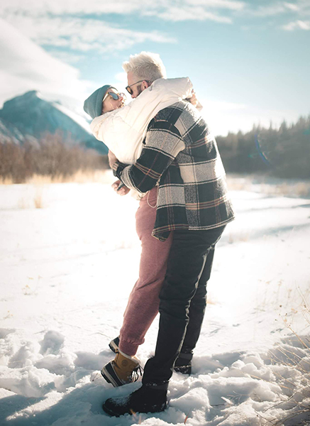 Rockies Rentals engagement - embrace - photo by Caleb Huizinga